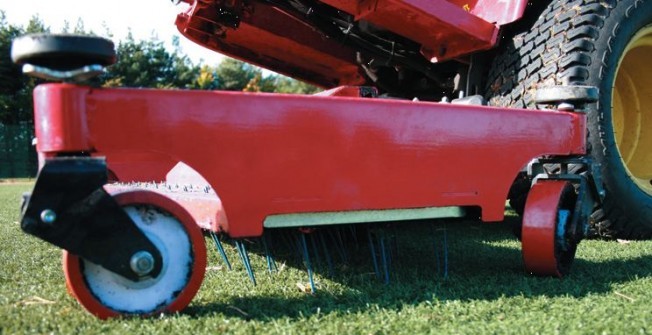 Drag Matting Synthetic Grass in West End